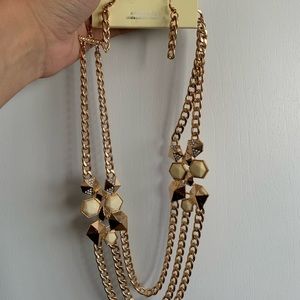 3 necklaces and 3 earrings. New Never used